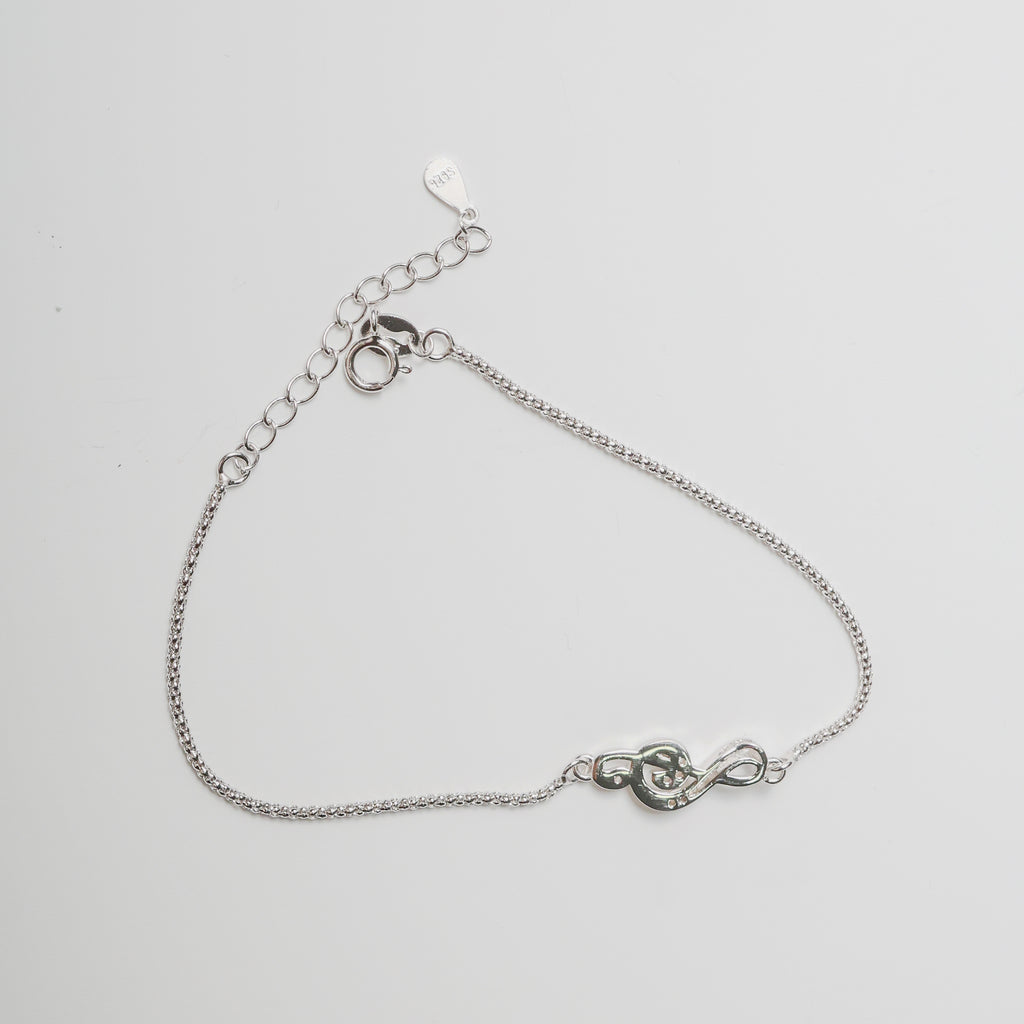 Bracciale nota musicale in argento con zirconi bianchi