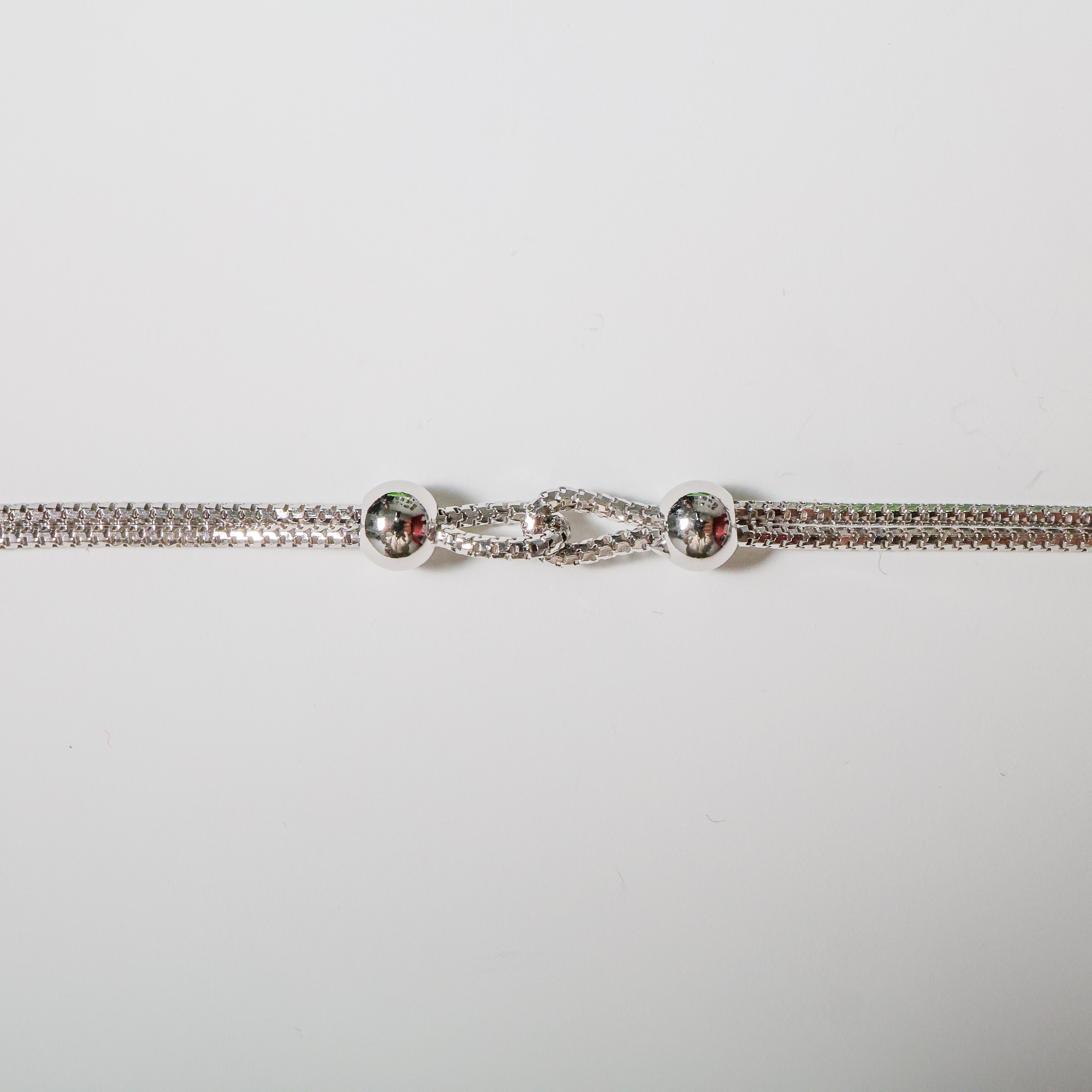 Bracciale nodo in argento con sfere