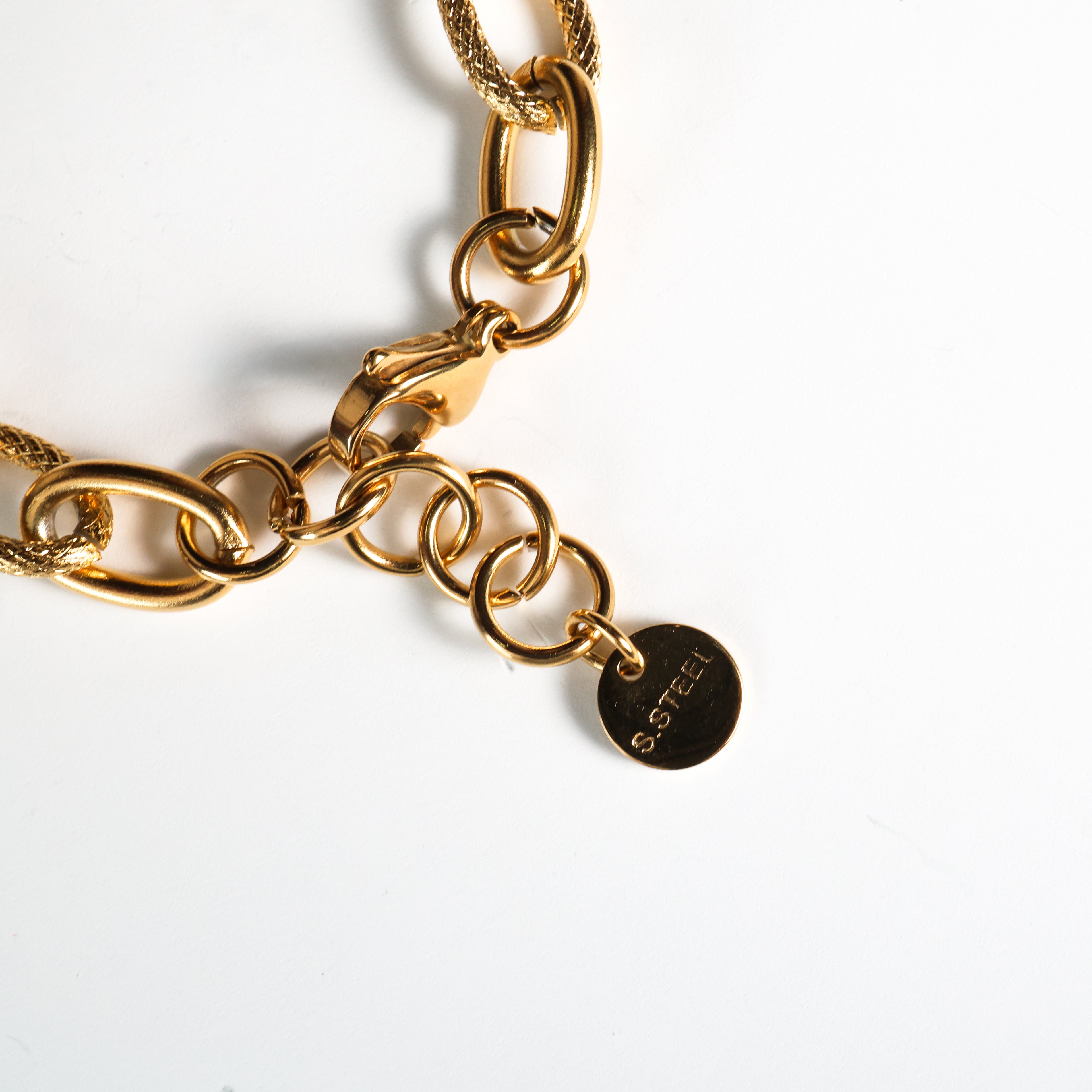 Bracciale catena acciaio con cuori pendenti