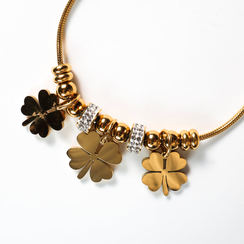 Bracciale acciaio con quadrifoglio pendenti e zirconi