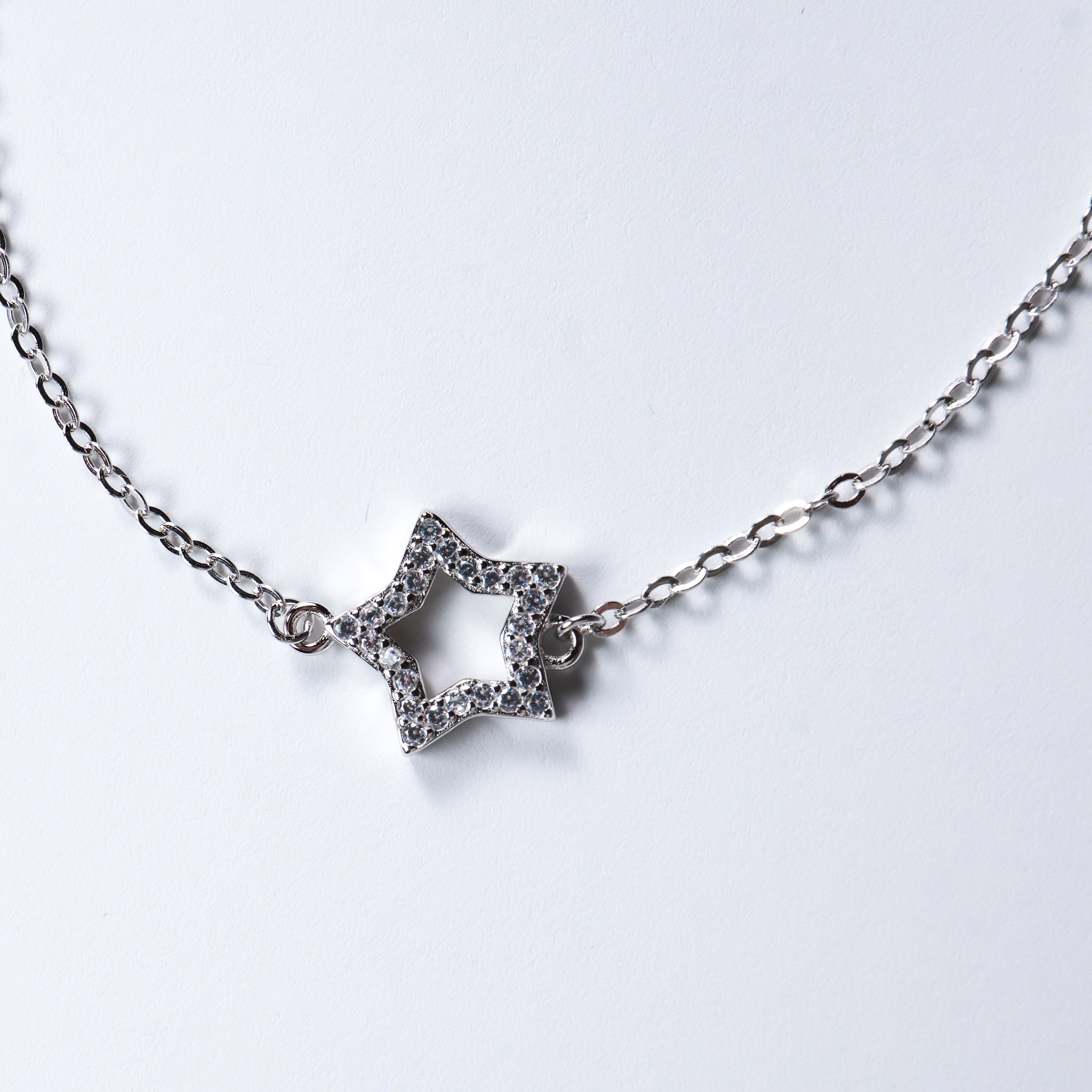 Bracciale argento catena con stella  e zirconi