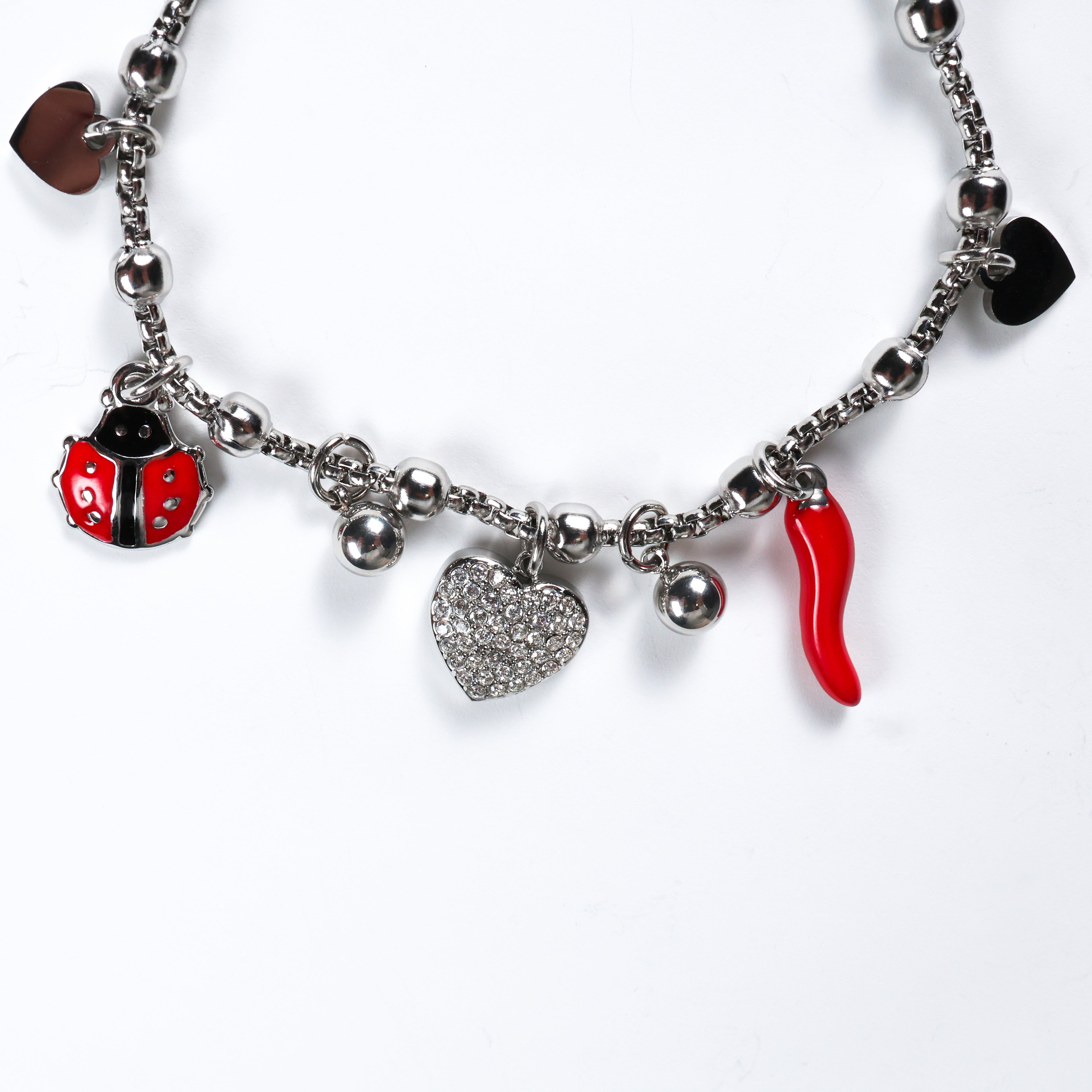 Bracciale acciaio con pendenti