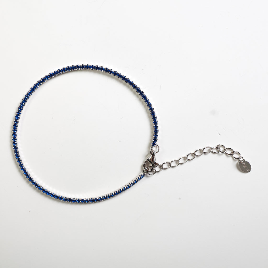 Tennis argento con pietre blu