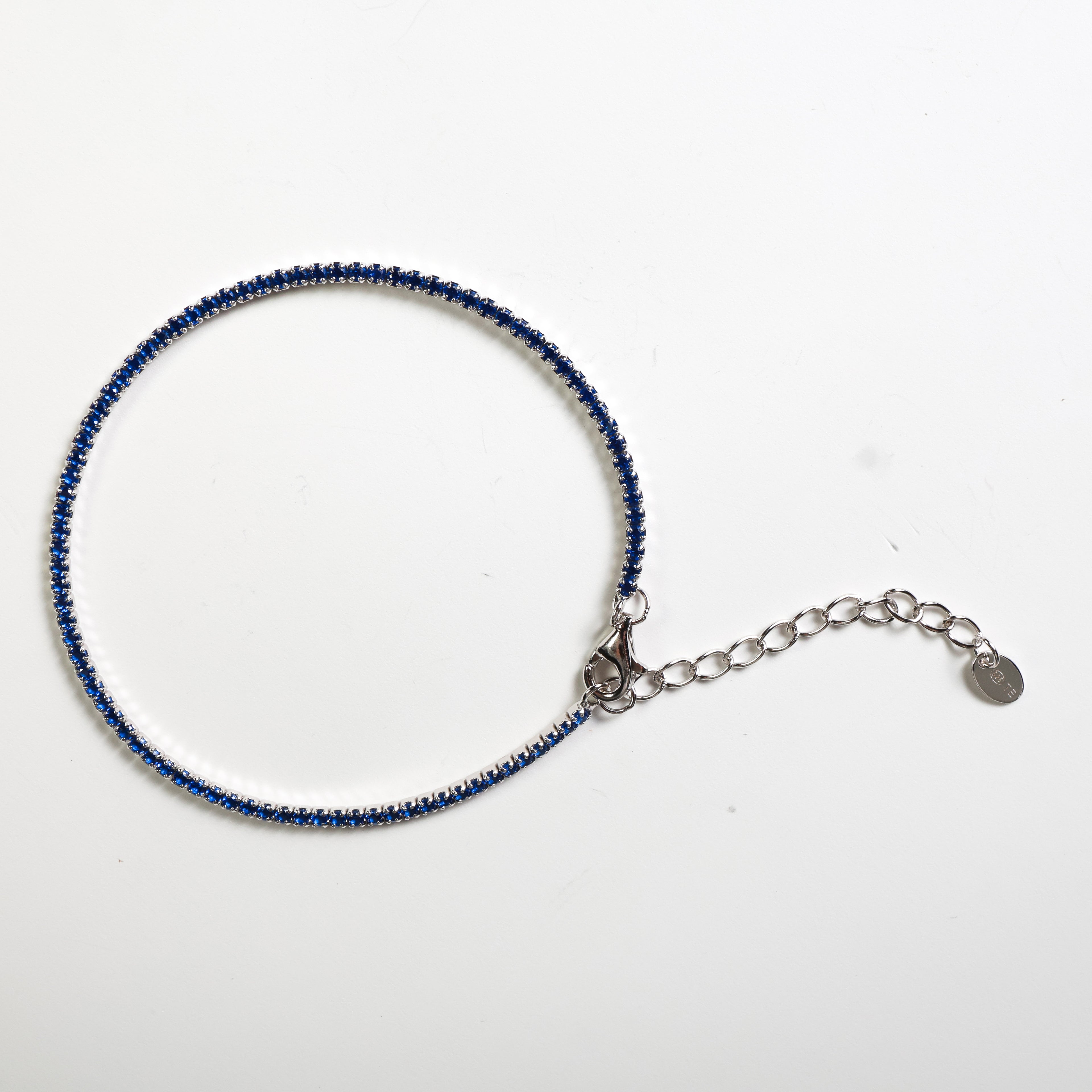 Tennis argento con pietre blu