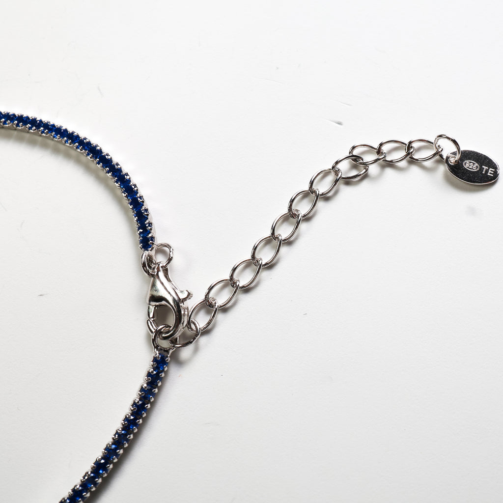 Tennis argento con pietre blu