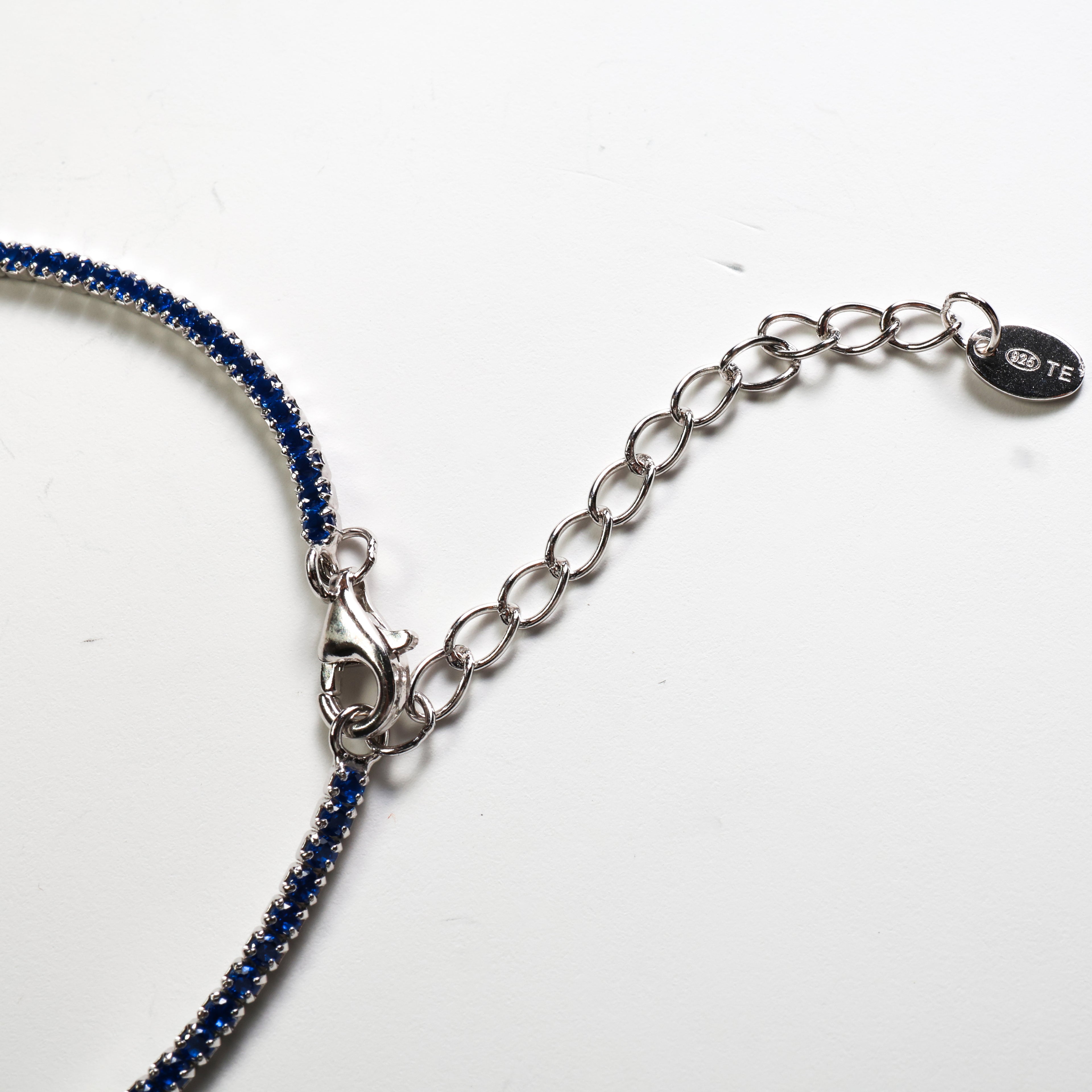 Tennis argento con pietre blu