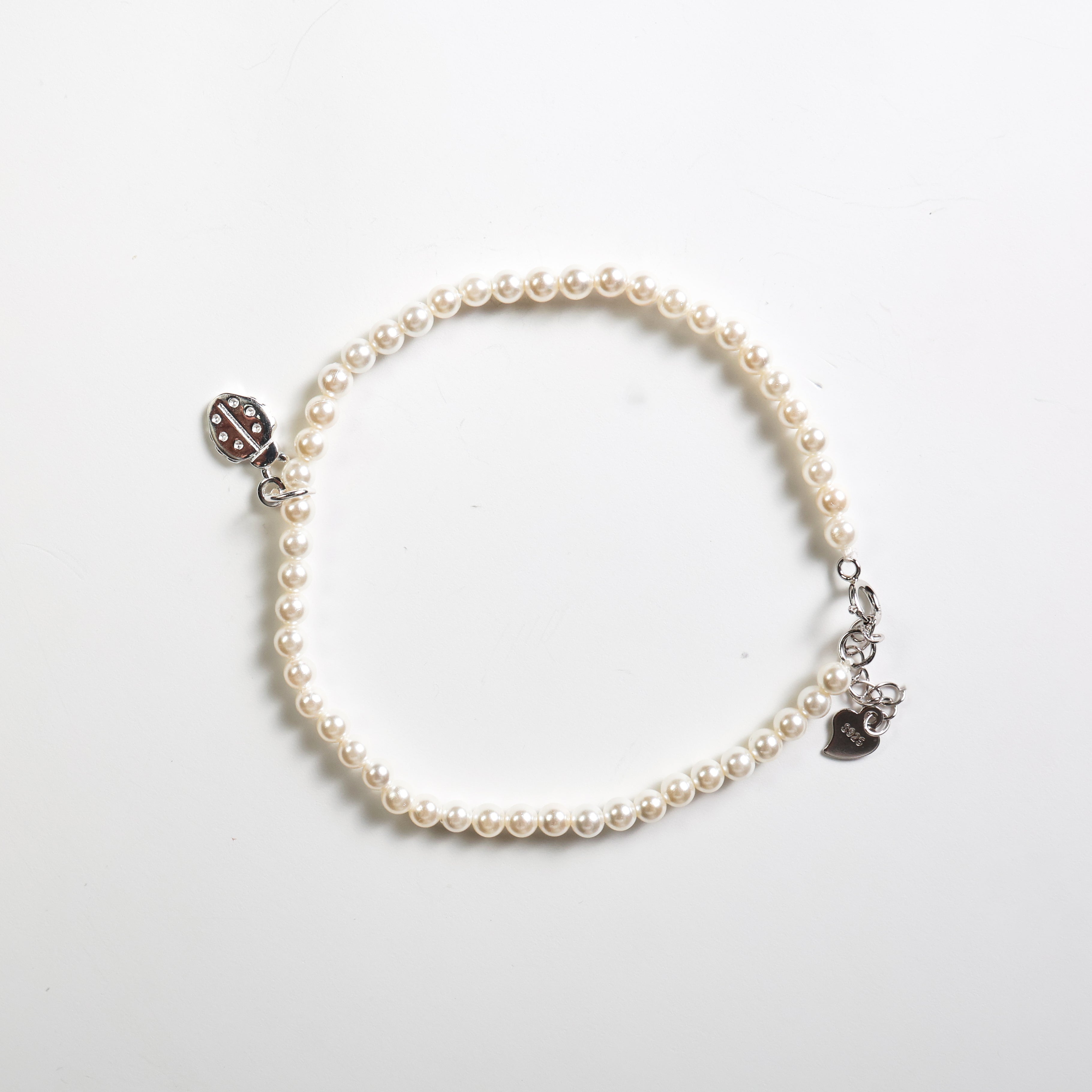 Bracciale perla con coccinella