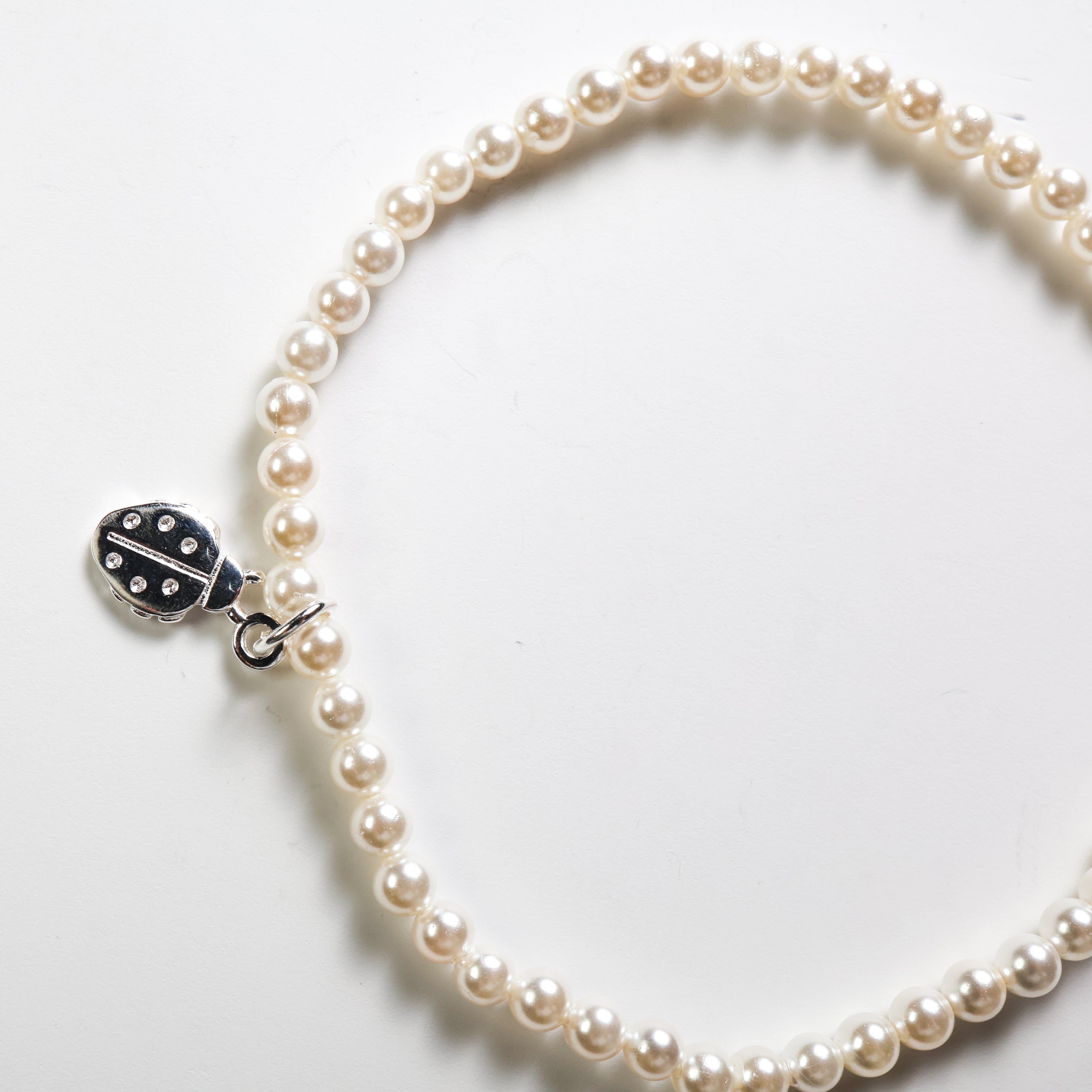 Bracciale perla con coccinella