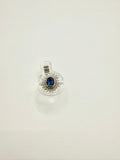 Anello con zaffiro blu e zirconi