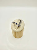 Anello veretta con zaffiro blu e zirconi in argento 925