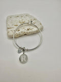 Bracciale in acciaio con pendente lettera: R