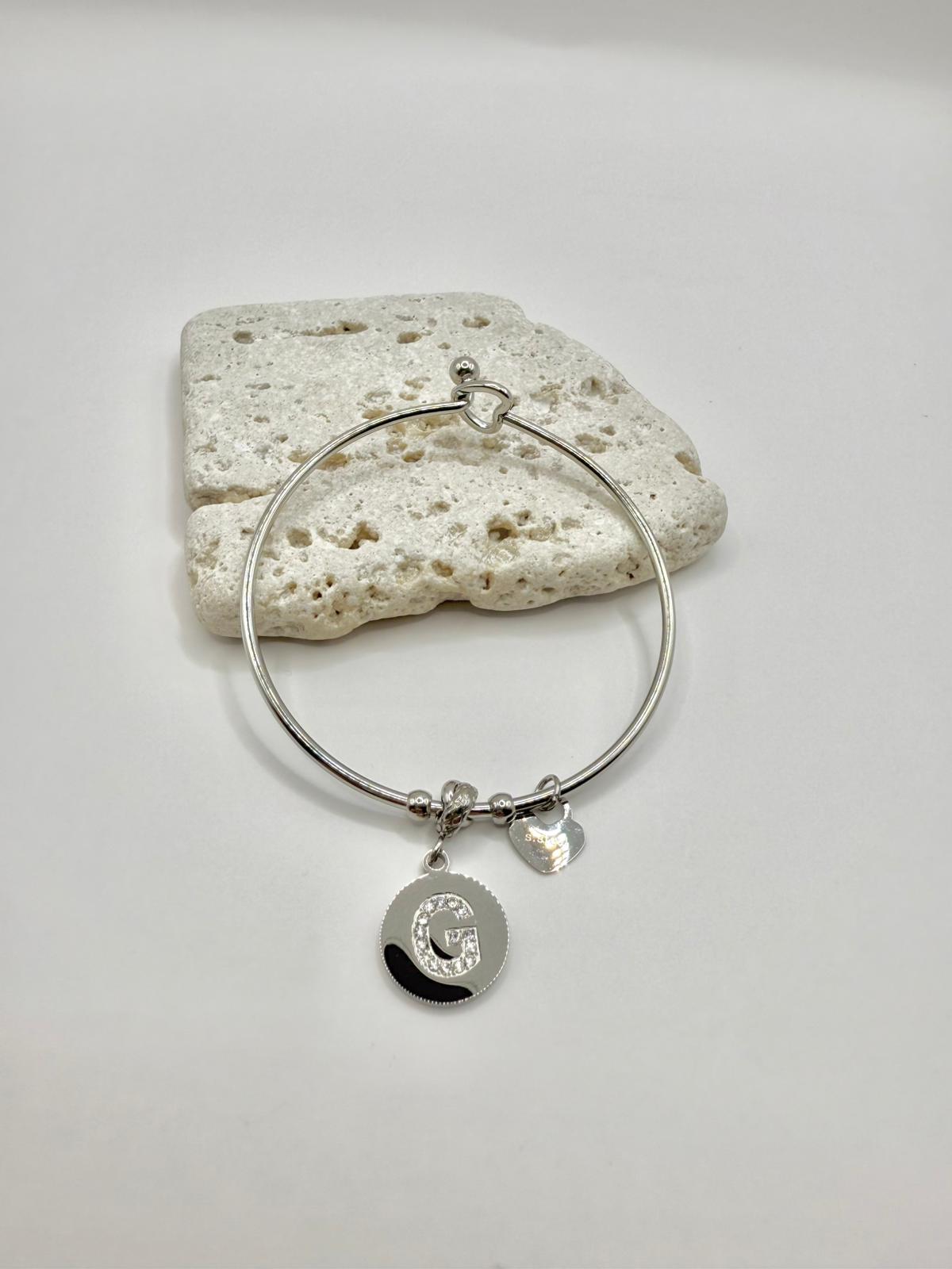 Bracciale in acciaio con pendente lettera: G
