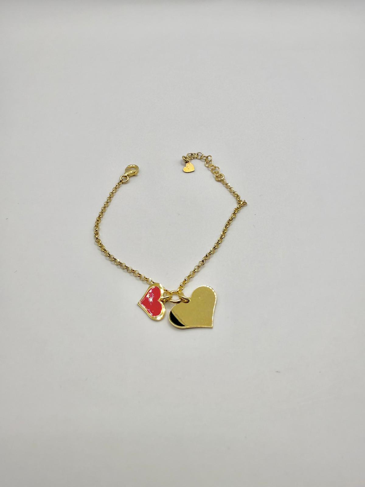 Bracciale color oro con pendente cuori