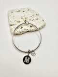 Bracciale in acciaio con pendente lettera: M