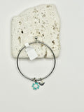 Bracciale con pendente quadrifoglio