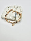 Bracciale palline con pendente cuore