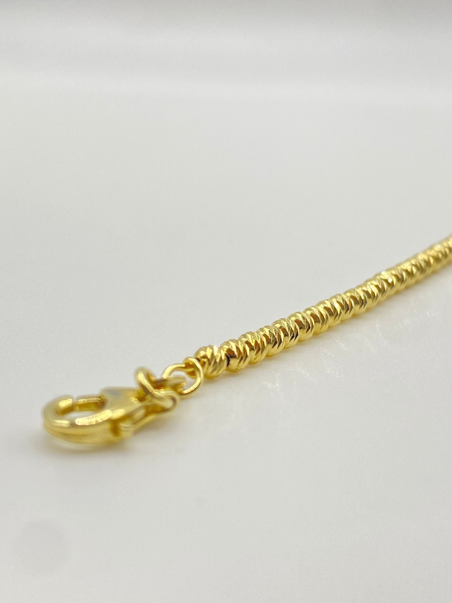 Bracciale mille luci color oro 5mm